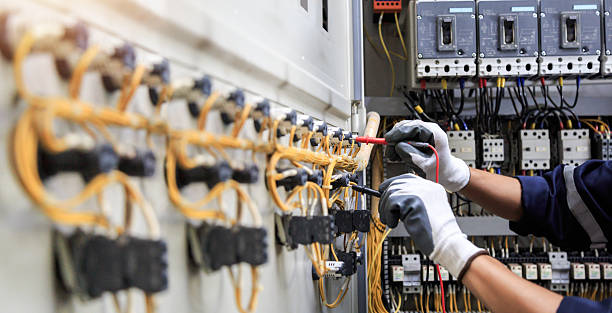 Professional Electrician technician working in Mont Clare, PA